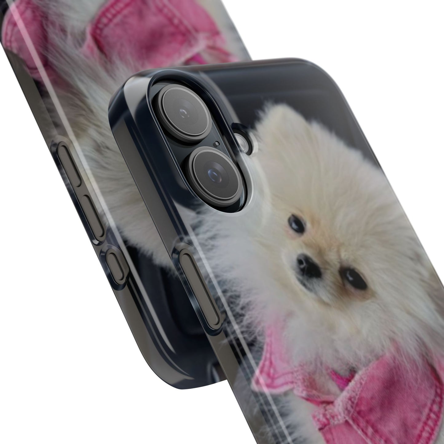 Phone case with a small dog wearing a pink jacket on a black background