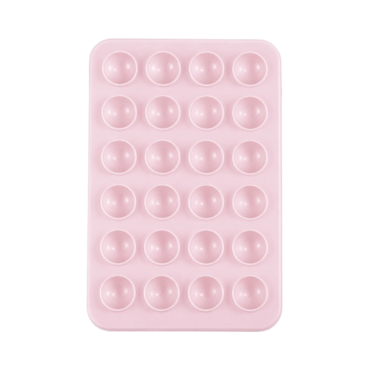 Pink silicone suction phone holder attached to smartphone for hands-free content creation and mirror selfies.
