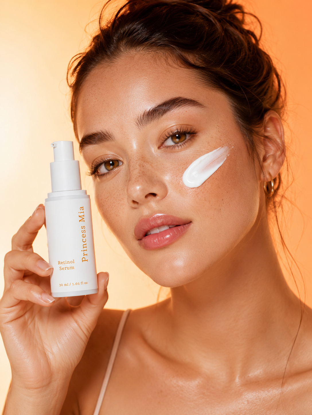 Princess Mia Retinol Face Serum held by model with a creamy serum texture, formulated to improve skin texture, firmness, and radiance.