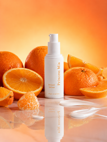 Princess Mia Retinol Serum surrounded by fresh oranges, showcasing a hydrating anti-aging facial serum with a natural retinol alternative for smoother, brighter-looking skin.
